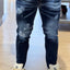 Jeans skinny con strappi B9000-75